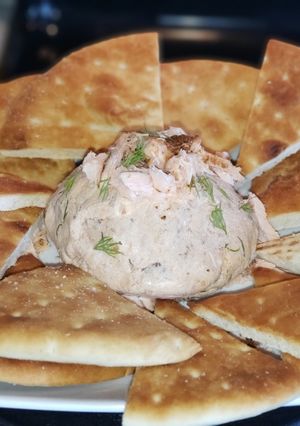 A picture of Smoked Salmon Dip with Homemade Pita Chips.