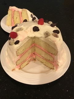 A picture of Almond Layer Cake with Rasberry Cream Filling.
