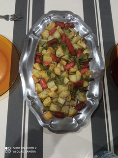 A picture of Grilled Potatoes, Sausages & Broad beans.