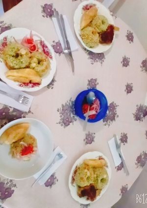Una foto de Arroz verde con pollo arrebosado