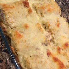 A picture of Chicken Bacon Alfredo Roll Ups.