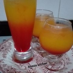 A picture of Orange and pineapple juice.