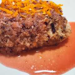 รูปของ Filetto di salmone ai porcini e salsa all'arancia tarocco