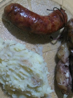 Una foto de Asado de tira y pechuga al ajillo en paquetes al parrigas