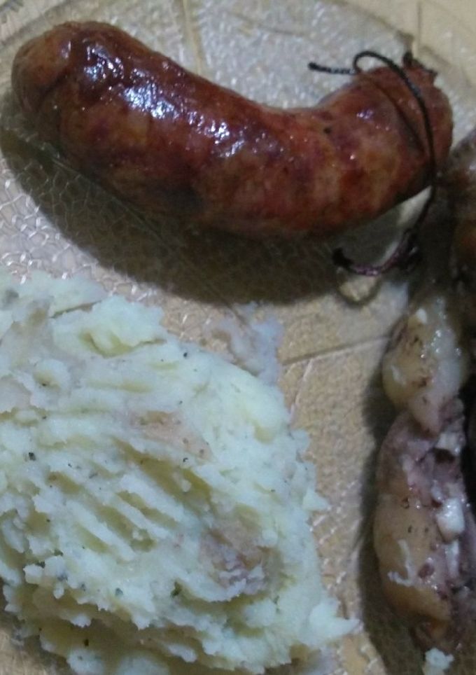 Una foto de Asado de tira y pechuga al ajillo en paquetes al parrigas