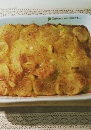 Foto di Tortino di patate a fette con spinaci, prosciutto e formaggio