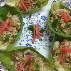 A picture of Leftover fried rice in cabbage cups.