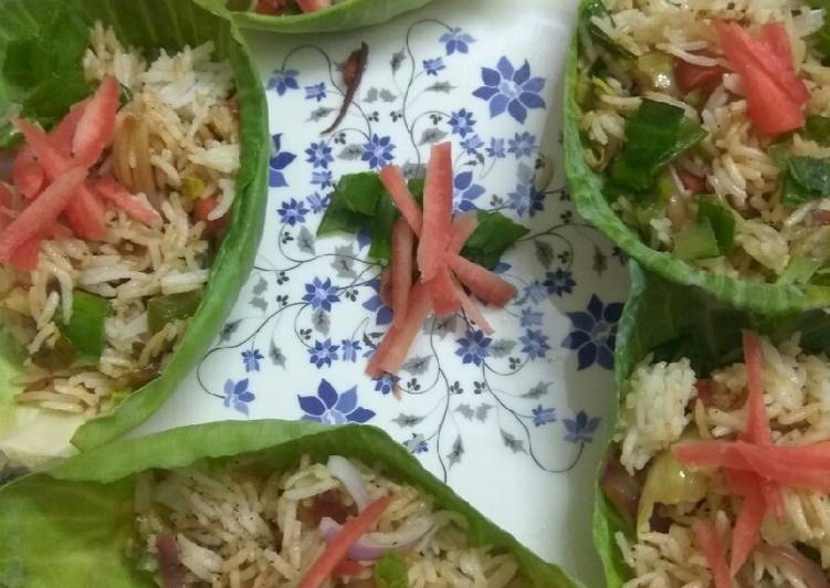 Leftover fried rice in cabbage cups