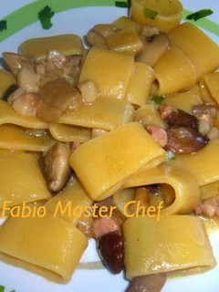 Foto di Calamarata con Funghi Porcini e Pancetta Affumicata