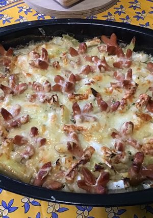 A picture of Turnip and Potato Gratin with Mini Pork Sausages.