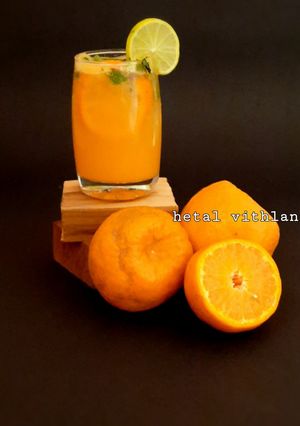 A picture of Orange mint mojito.