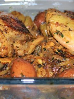 A picture of Lemon & Herb Roasted Chicken and potatoes.