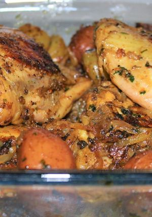 A picture of Lemon & Herb Roasted Chicken and potatoes.