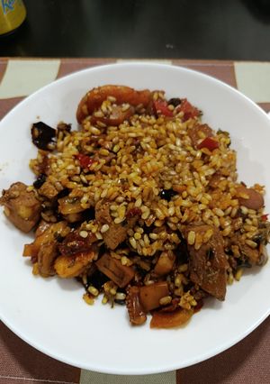 Foto principal de Arroz con sepia, mero y gamas