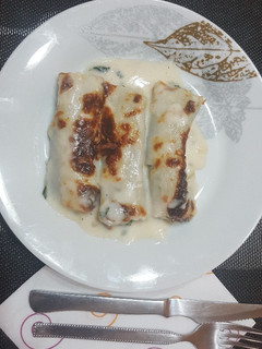 Una foto de Canelones de espinacas