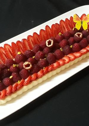 Une photo de Tarte fraises framboises