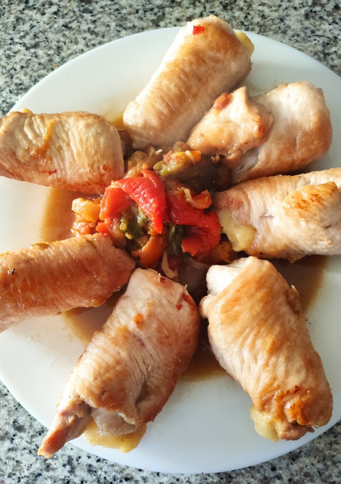 Una foto de Pechuga de pavo con pimientos