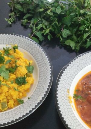 A picture of Mung ki khari daal with tomato qeema carry.