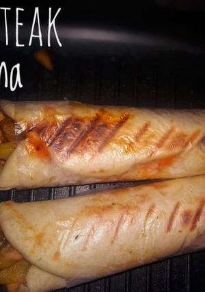 A picture of Leftover chicken steak shawarma.