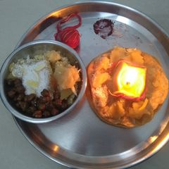 Halwa puri and Black Chana (Durga Ashtami Prasad) A picture of Halwa puri and Black Chana (Durga Ashtami Prasad).
