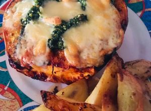Una foto de Calabaza Rellena de Espinaca, Ricotta y Queso Provolone ♥️
