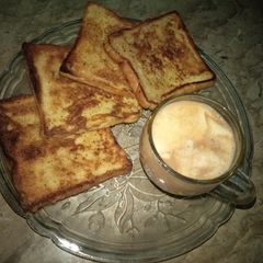 A picture of Egg Sandwich with tea 😋😋😋.