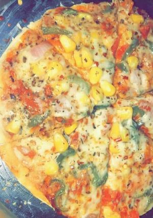 A picture of Corn pizza.