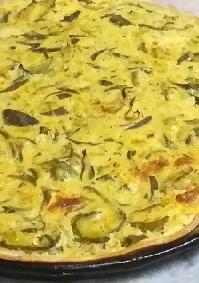 Una foto de Tarta de zapallitos con masa casera!