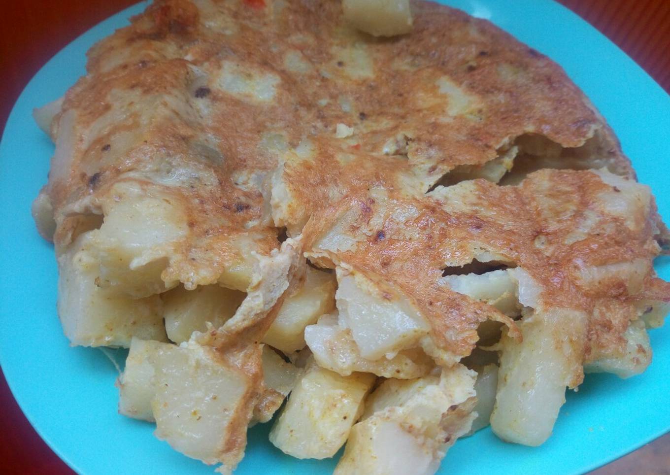 Fried potatoes with egg