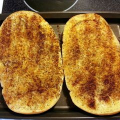 A picture of cheesy garlic bread.