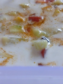 A picture of Tomato and Cucumber kichadi.