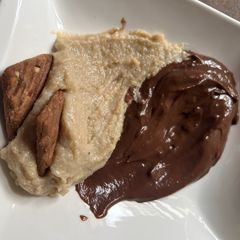 A picture of Creamy Plantain & chocolate pudding.