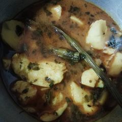 A picture of Potato drumstick curry.