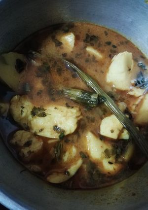 A picture of Potato drumstick curry.