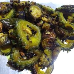 A picture of Bitter gourd and brinjal fry.