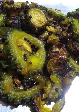 A picture of Bitter gourd and brinjal fry.