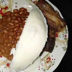 A picture of Title #endofyearchallenge ugali coconut beans kafry pork.