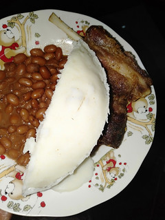 A picture of Title #endofyearchallenge ugali coconut beans kafry pork.