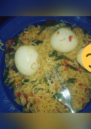 A picture of Noodles & boiled egg garnished with spring onions #Sokoto state.