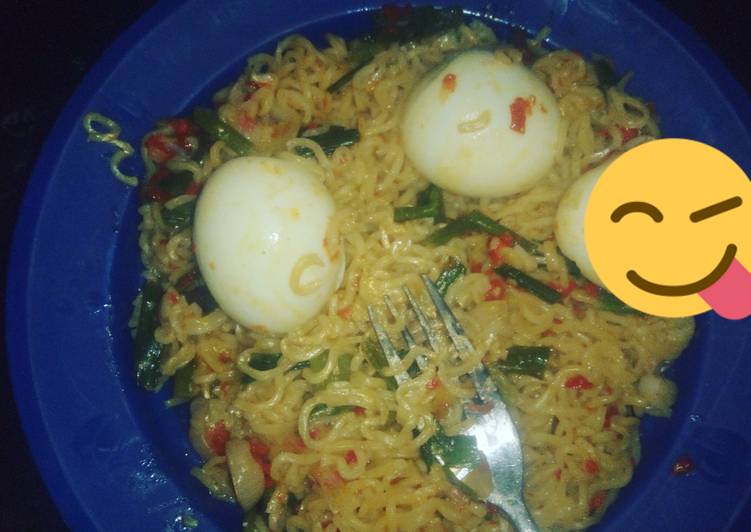 Noodles &amp; boiled egg garnished with spring onions #Sokoto state