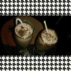 A picture of Cold coffee with Coco and cream.
