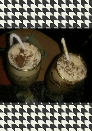 A picture of Cold coffee with Coco and cream.