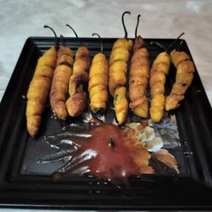 Green chilli roll fry in 10minutes A picture of Green chilli roll fry in 10minutes.