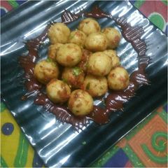 A picture of Suji masala balls.