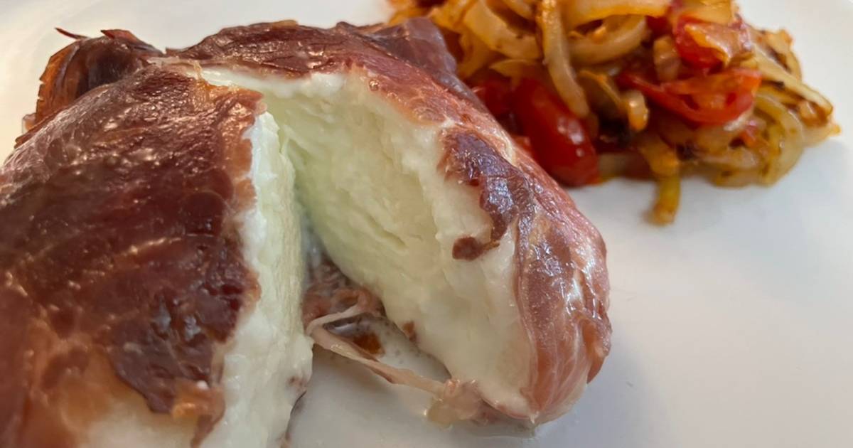 Oven Baked Mozzarella wrapped in Parma Ham, with sautéed Onion and