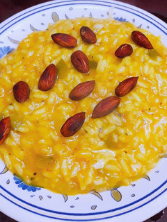 Una foto de Risotto de calabaza y almendras tostadas