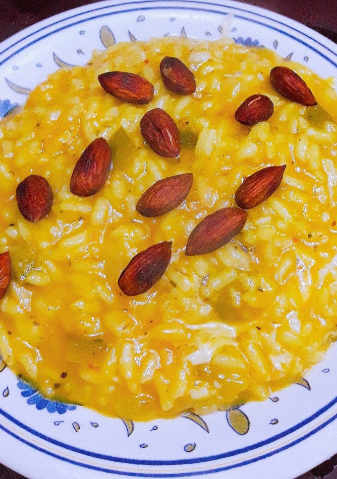 Una foto de Risotto de calabaza y almendras tostadas