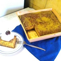 A picture of Malva Pudding with caramel sauce.