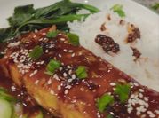 A picture of salmon fillet with sauce
