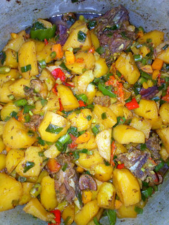A picture of Garnished potatoes.